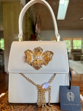 House of Harlow 1960 White Mini Top-Handle Bag with Gold Floral Accent